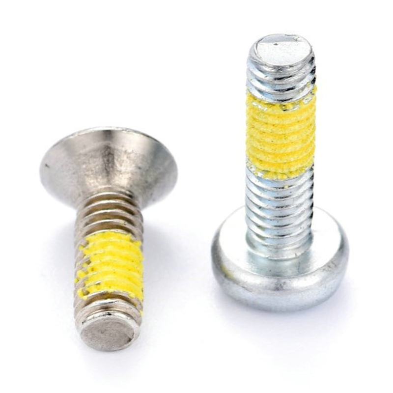Pan(forsænket) hoved torx(sekskant) maskinskrue med gul nylon lap